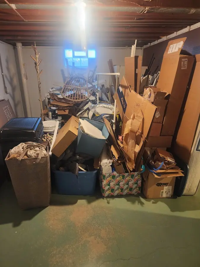 Roll-off dumpster container at job site for 15 Yard Dumpster Rental in Deschutes River Woods